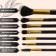 A set of makeup brushes, 7 objects, a lightning cover, black color