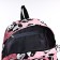 A backpack with a zipper, 3 outer pockets, pink color