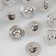 A button on the leg, d = 15 mm, the color is silver