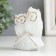 Souvenir Ceramics "Eagle owl with an owl on the house" White with gold 7.5 cm