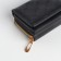 Women's wallet on the button, black color