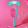 The comb is massage, wide, ventilated, 8.5 × 20.5 cm, PVC box, turquoise/pink color