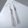 Hanging earrings "Waterfall" narrow, silver color, 7 cm