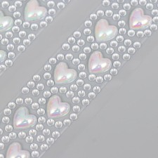 Decorative self -adhesive tape from rhinestones. The length is each 300 mm, the width is 25 mm.