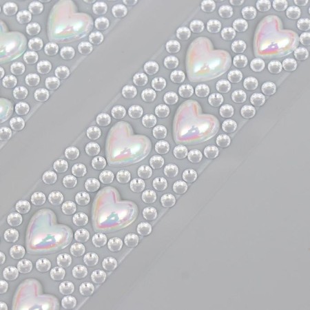 Decorative self -adhesive tape from rhinestones. The length is each 300 mm, the width is 25 mm.