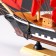The ship souvenir medium "Flora", Black side with a white strip, red sails, 32x6.5x31 cm