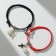 Bracelets "Demetrons" on the magnet, phosphorus balls, cross, black-red color, 6 cm