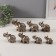 Souvenir Polystone "Seven Elephants in Popons with a magnificent flower" H-10; 9; 8; 7; 6; 5; 4 cm