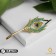Brooch "Pen" Firebirds, colored in yellow gold
