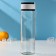 A glass bottle with a handle in a flamingos cover, 500 ml, h = 23.5 cm, Mix drawing