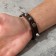 Bracelet Skin "Skull" with spikes, brown color with black silver, 23 cm