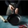 Sleeps "Jacqueline", D = 25 cm, thickness 0.65 mm, plastic handle, anti -stick coating, black color