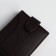 Men's purse on the button, a department for cards, coins, brown color
