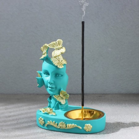 Caus -face "face", turquoise