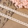 Knitted lace, 10 mm × 15 ± 1 m, beige color