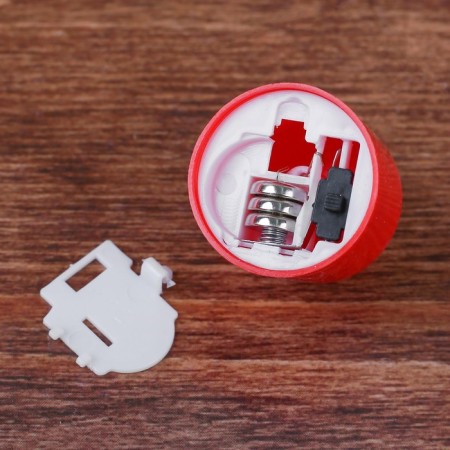 The candle is LED, burning yellow-3