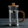 Teapot in a tender of jacket - press "Eco", 1 liter