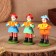 Dymkovo toy "Standing man with an accordion"