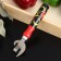 The opener is not riveted, 16 × 4 cm, with an artistic painting and a beech handle, mix