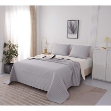 The bedspread and pillowcase 