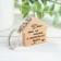 A keychain "House is not a place, but a state of mind", 4.1x4 cm, Book