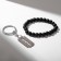 Set 2 objects: bracelet, keychain "blade", black color in silver