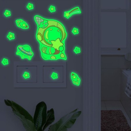 The plastic sticker glows in the dark on the switch "Cosmonaut with asterisk" 15.5x20 cm