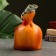 The piggy bank "Sag - happiness and good" orange, 17cm