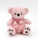 Soft toy "Bear in a scarf", color mix