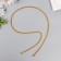 Chain with 2 carbines a link thickness 0.1 cm 0.4x60 cm gold/silver mix