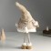 Interior doll "Santa Claus in a beige fur coat with a star on a cap" 19x12x45 cm