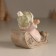 Souvenir Polystone "Baby in a sled, flies from the hill" Pink 9x7.8x9 cm