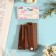 Tag with the "Hand Made" button, 8 × 1.5 cm, 10 pcs, brown color