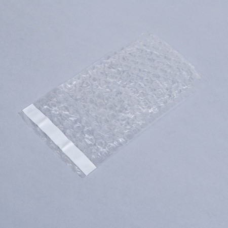 A package from a runway with a valve and an adhesive layer, p/e, 8 x 12 + 5 cm-1