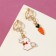 Clips children's "chosen" bunny with carrots, colored in gold