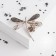 Book "Dragonfly" with a flower, the color is gray-brown in coffee gold