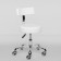 The chair for the master Romano is low, the color is white
