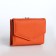 Women's wallet on the button, orange color