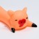 Pig's squeak "Pig on vacation" for dogs, 14.5 x 5 cm, beige