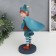 Souvenir Polystone Standing "Baby-Skomorokh with a bag" Orange-blue 33x12.5x25.5 cm