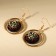 Earrings with rings "just be the queen"