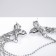 Hanging earrings with rhinestones "Firebird" with a chain, red color in silver, 8 cm
