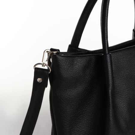 The bag is female, medium size, long belt, black color-3