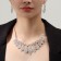 Set 2 objects: earrings, necklace "elegy" almonds, white color in silver, 40 cm