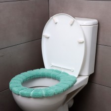 Soft cover on the lid and seat of the toilet (green)