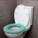 Soft cover on the lid and seat of the toilet (green)