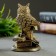 Figure "Filin on Books" Ogent gold 11x7x7cm