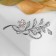 Brooch "Branch" with a flower, white color in silver