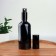 A bottle for storage, with a sprayer "Black", 100 ml, black color