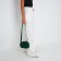 Bag Cross-Bodi with a zipper, green color